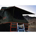 Roam rooftop tent on a vehicle with a desert landscape in the background